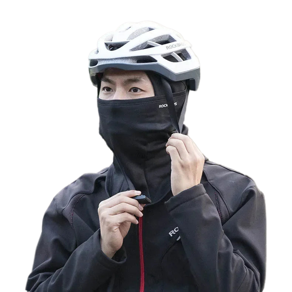 Cyclist in a white helmet and black mask wearing a MOTORCYCLE BALACLAVA WINTER