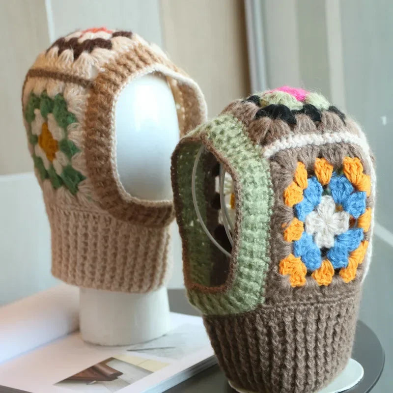 Crocheted winter hats featuring colorful granny square patterns for the White Knit Balaclava